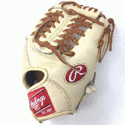 p>Rawlings Heart of the Hide Camel leather and brown laced. 11.5 inch Modified Trap Web and Open Ba